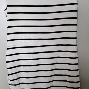 Womens sleeveless top with asymmetrical waistline